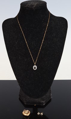 Lot 330 - A modern 9ct gold blue sapphire and white...