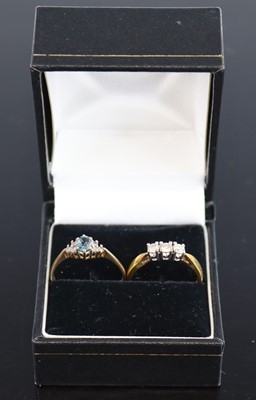Lot 337 - A yellow metal diamond three-stone ring,...