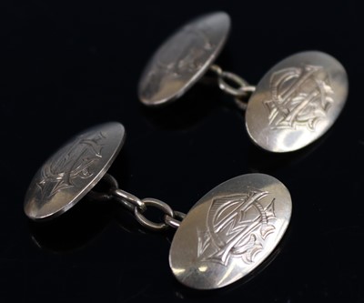 Lot 338 - A pair of 9ct gold oval cufflinks, each side...