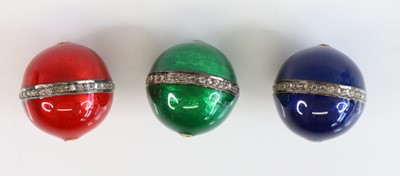 Lot 370 - Three guilloche enamel beads, in red, green...
