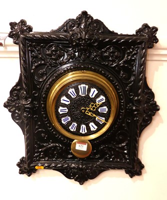 Lot 621 - A black framed and brass inlaid wall clock,...