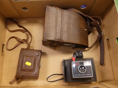 Lot 582 - A collection of cameras and camera equipment,...