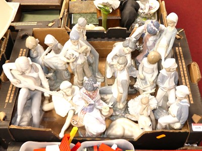Lot 668 - A collection of various Lladro and Nao figures...