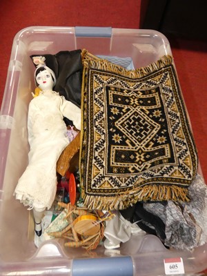 Lot 605 - A box of toys, to include dolls house...