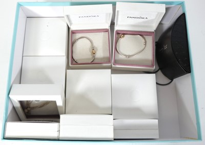 Lot 435 - A collection of Pandora charm bracelets