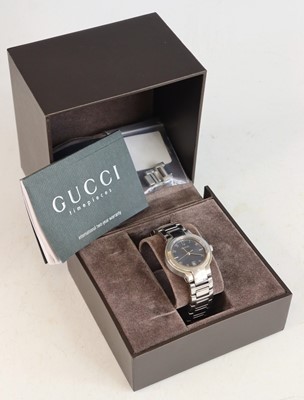 Lot 399 - A lady's Gucci steel cased quartz wrist watch...