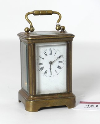 Lot 451 - A French lacquered brass minuet carriage clock,...