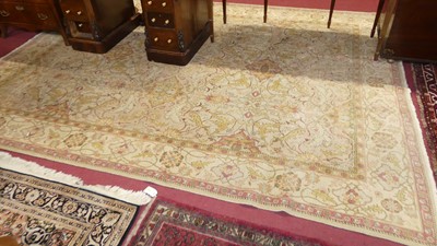 Lot 1136 - A large Persian woollen cream ground Tabriz...
