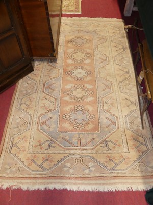 Lot 1137 - A Turkish woollen pale ground kelim rug,...