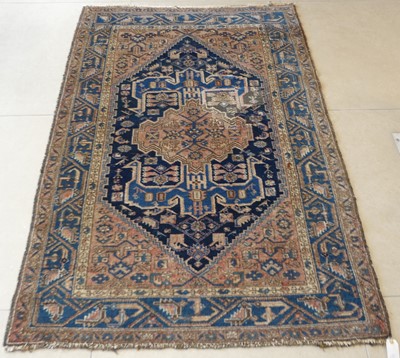 Lot 1145 - A Persian woollen blue & peach ground Malayer...