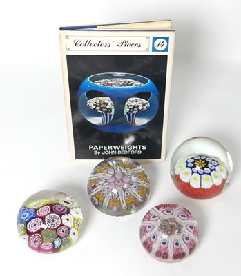 Lot 460 - A group of four art glass paperweights, to...