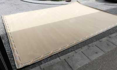 Lot 1325 - An extremely large sisal rug, with floral...