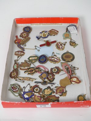 Lot 470 - A collection of enamelled metal badges related...