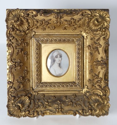 Lot 534 - A reproduction portrait miniature of a lady,...