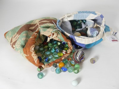 Lot 478 - A collection of glass marbles, various designs,...