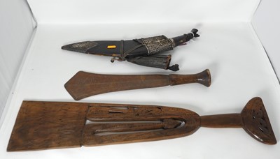 Lot 538 - A Nepalese Kukri, having a curved steel blade...