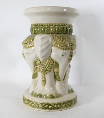 Lot 542 - A reproduction pottery garden stool in the...