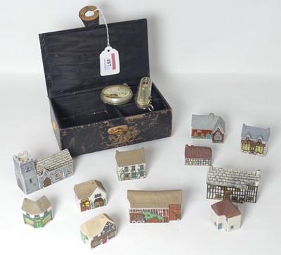 Lot 487 - A black leather jewellery box, decorated with...