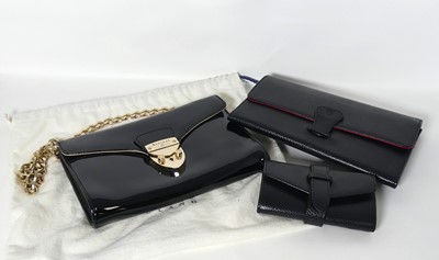 Lot 556 - An Aspinal of London lady's patent leather...