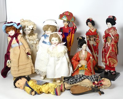 Lot 558 - A collection of dolls, to include Kate...