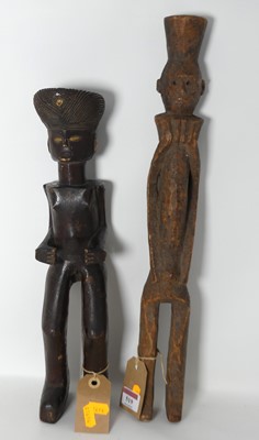 Lot 519 - An African carved wooden ancestor figure, Lele...