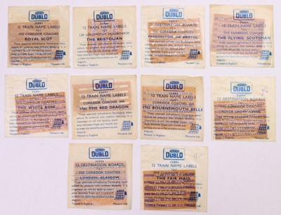 Lot 335 - Ten Hornby Dublo train name labels and...