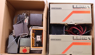 Lot 735 - Two boxes containing various controllers and...