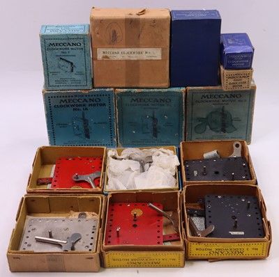 Lot 2112 - 14 Meccano clockwork motors, to include two...