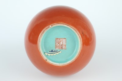 Lot 84 - A pair of Chinese coral-red bottle vases with...