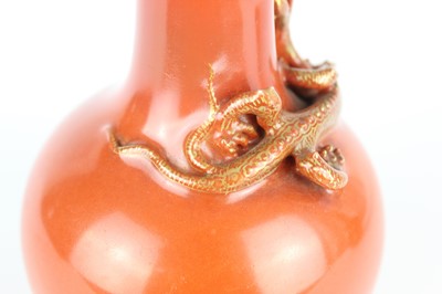 Lot 84 - A pair of Chinese coral-red bottle vases with...