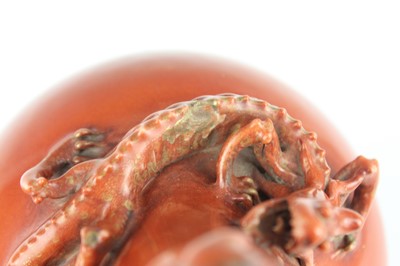 Lot 84 - A pair of Chinese coral-red bottle vases with...