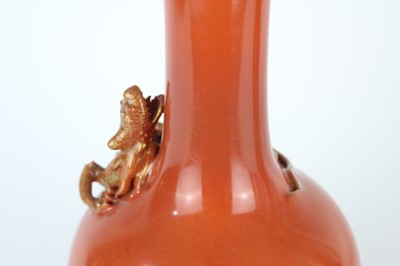 Lot 84 - A pair of Chinese coral-red bottle vases with...
