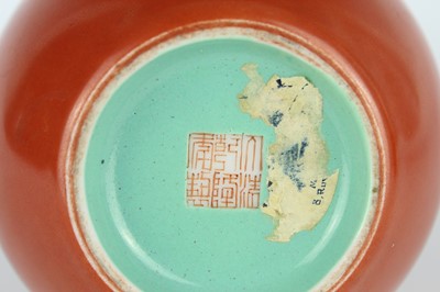 Lot 84 - A pair of Chinese coral-red bottle vases with...