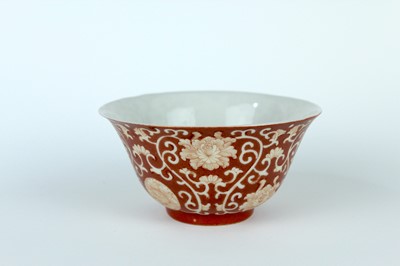 Lot 83 - A pair of Chinese coral-red ground ‘lotus’...