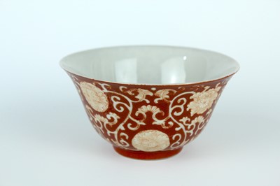 Lot 83 - A pair of Chinese coral-red ground ‘lotus’...