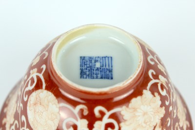 Lot 83 - A pair of Chinese coral-red ground ‘lotus’...