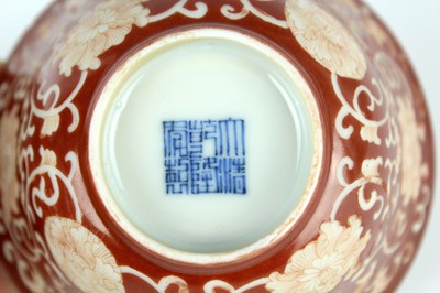 Lot 83 - A pair of Chinese coral-red ground ‘lotus’...