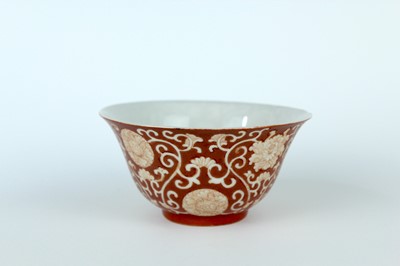 Lot 83 - A pair of Chinese coral-red ground ‘lotus’...