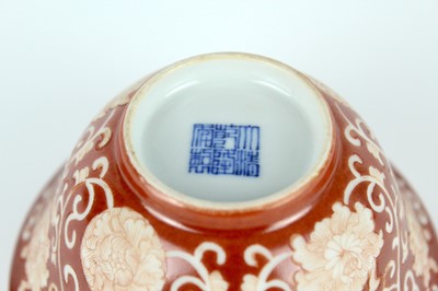 Lot 83 - A pair of Chinese coral-red ground ‘lotus’...