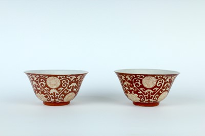 Lot 83 - A pair of Chinese coral-red ground ‘lotus’...