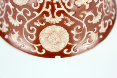 Lot 83 - A pair of Chinese coral-red ground ‘lotus’...