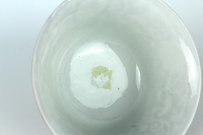 Lot 83 - A pair of Chinese coral-red ground ‘lotus’...