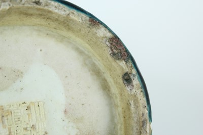 Lot 76 - A Chinese peacock-blue glazed jar with wood...