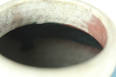 Lot 76 - A Chinese peacock-blue glazed jar with wood...