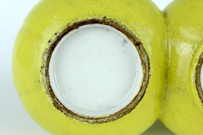 Lot 81 - A rare Chinese lemon-yellow glazed conjoined...