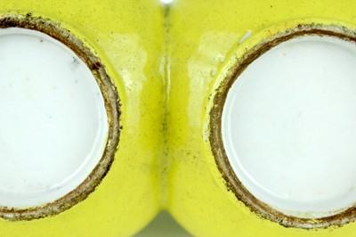 Lot 81 - A rare Chinese lemon-yellow glazed conjoined...
