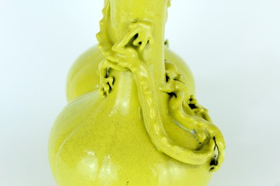 Lot 81 - A rare Chinese lemon-yellow glazed conjoined...