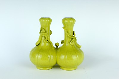Lot 81 - A rare Chinese lemon-yellow glazed conjoined...
