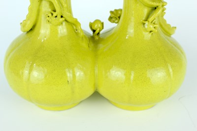 Lot 81 - A rare Chinese lemon-yellow glazed conjoined...