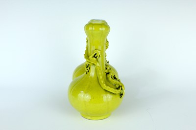 Lot 81 - A rare Chinese lemon-yellow glazed conjoined...
